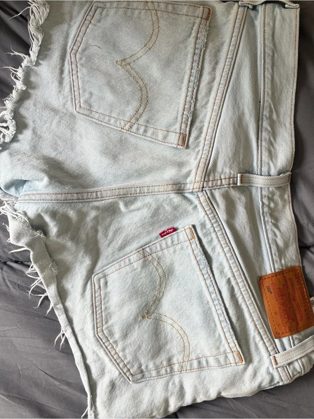 Levi's Light Blue Frayed Hem Cropped Denim Shorts